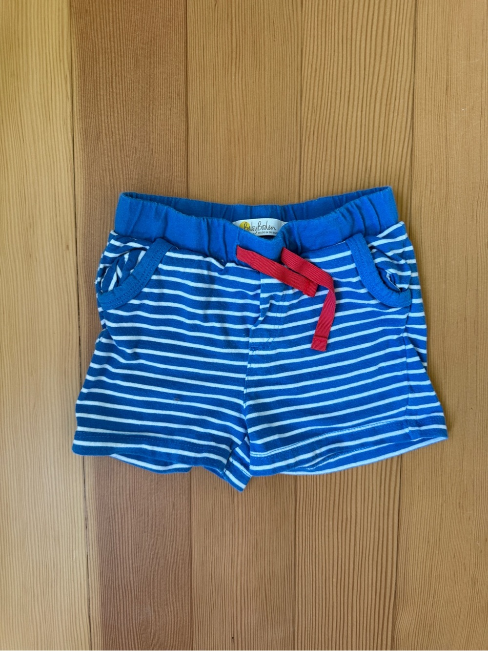 Baby Boden Blue and White Striped Cotton Shorts with Red Drawstring